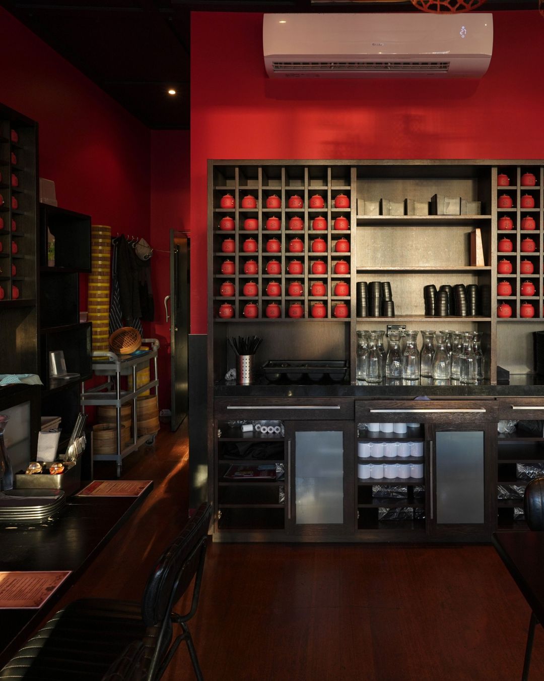 The back bar and the wall of red jars